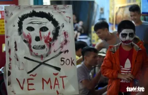 A Board Shows Off Prices For Halloween Themed Face Painting On Bui Vien Street In District 1, Ho Chi Minh City, October 31, 2019. Photo: Duyen Phan / Tuoi Tre