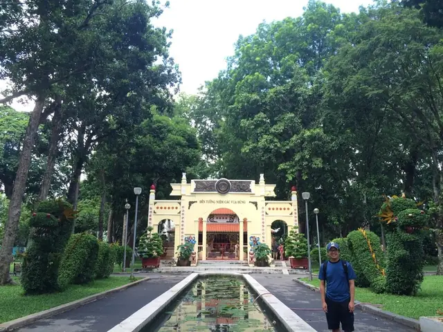 Temple In The Park With Some Cute Dragon Bush Sculptures