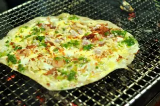 Bánh Tráng Nướng Bà Khùng Đà Lạt: Địa Chỉ 61 Nguyễn Văn Trỗi Có Thực Sự Đáng Thử?