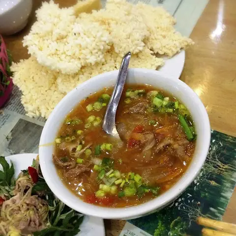Cẩm Nang Trải Nghiệm Ẩm Thực: Cơm Cháy Sốt Dê Ninh Bình Độc Đáo