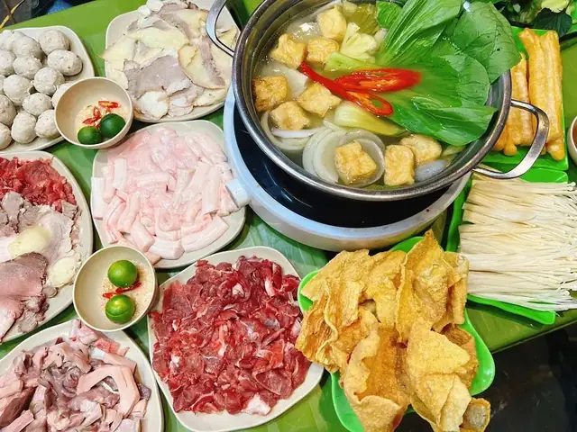 Đánh Giá Chi Tiết Lẩu Bò Nhúng Dấm Cầu Giấy: Trải Nghiệm Ẩm Thực Đặc Sắc Khi Du Lịch Hà Nội